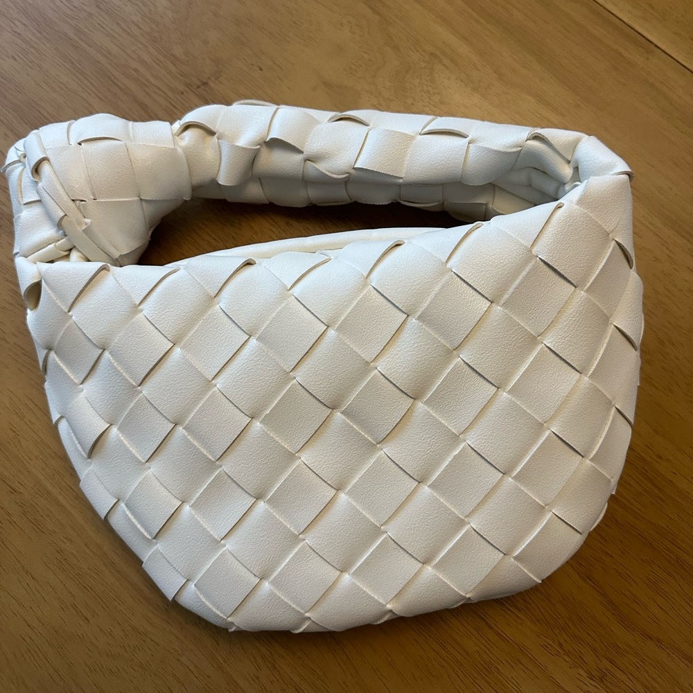 Braided faux leather hand bag